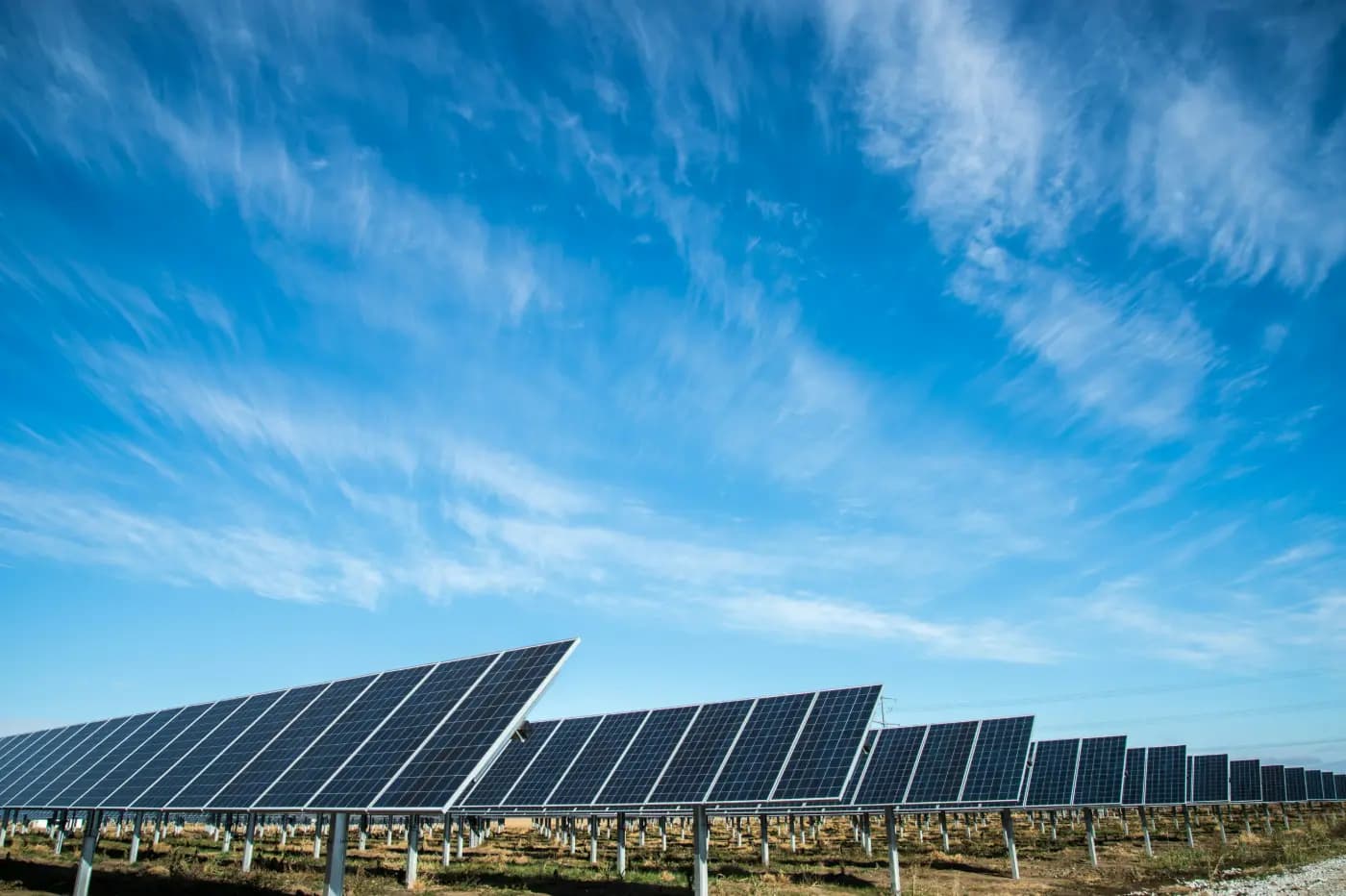 Background image of a solar farm
